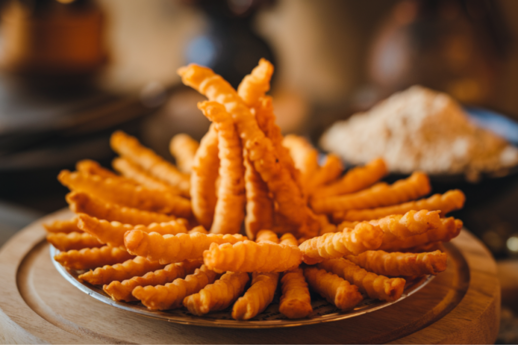 Close-up of crispy chicharrones on a wooden board

